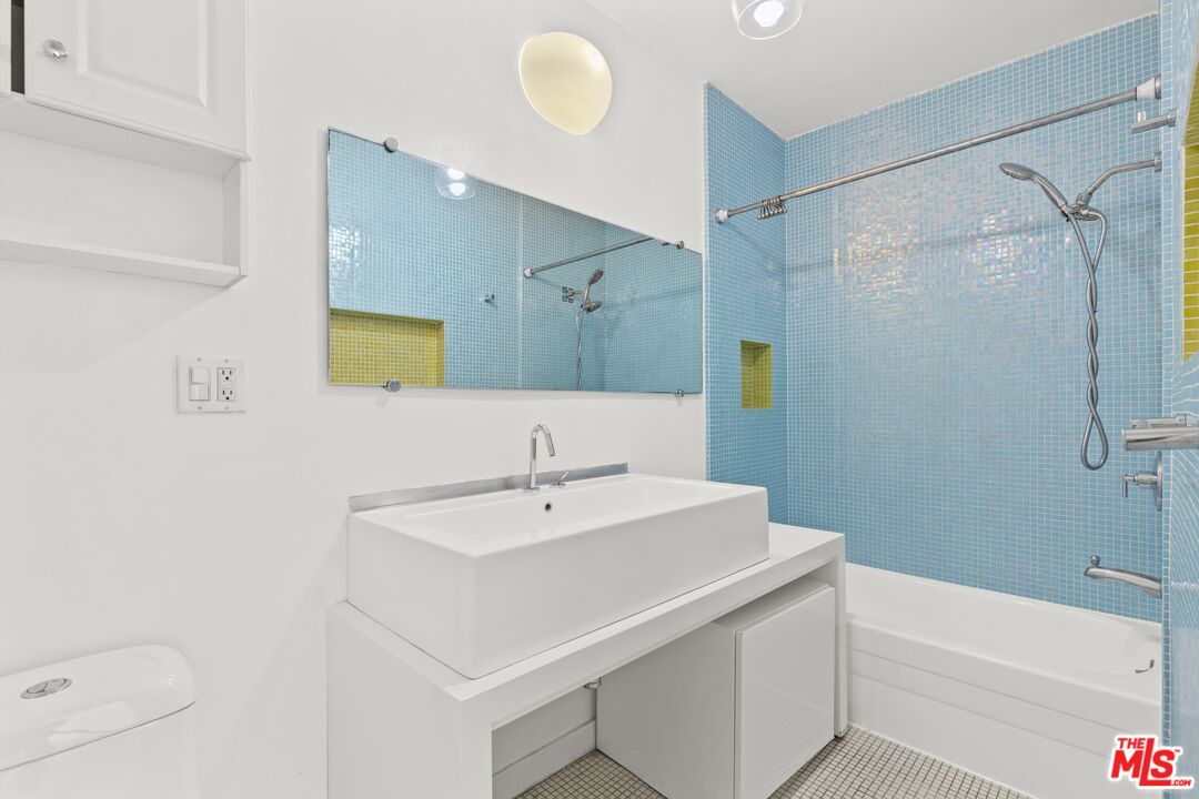 25 Spinnaker Street, Unit 12 Marina del Rey, CA 90292 - Photo 11 of 29 a bathroom with a sink a toilet and shower