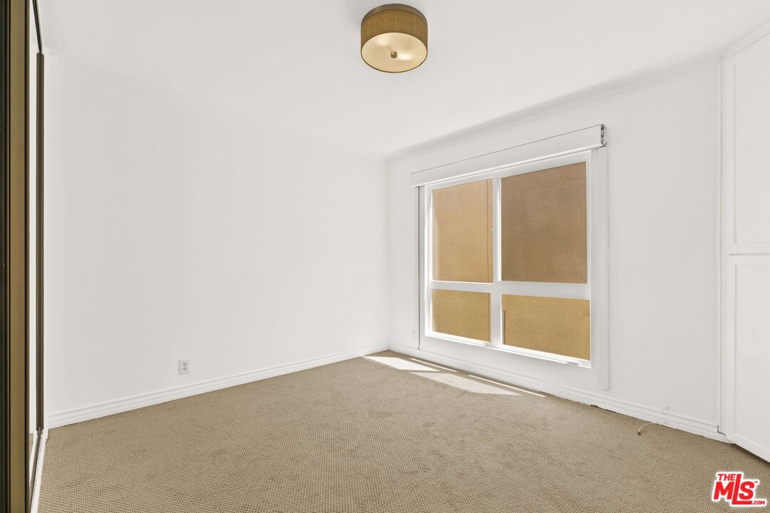 25 Spinnaker Street, Unit 12 Marina del Rey, CA 90292 - Photo 12 of 29 a view of empty room with window