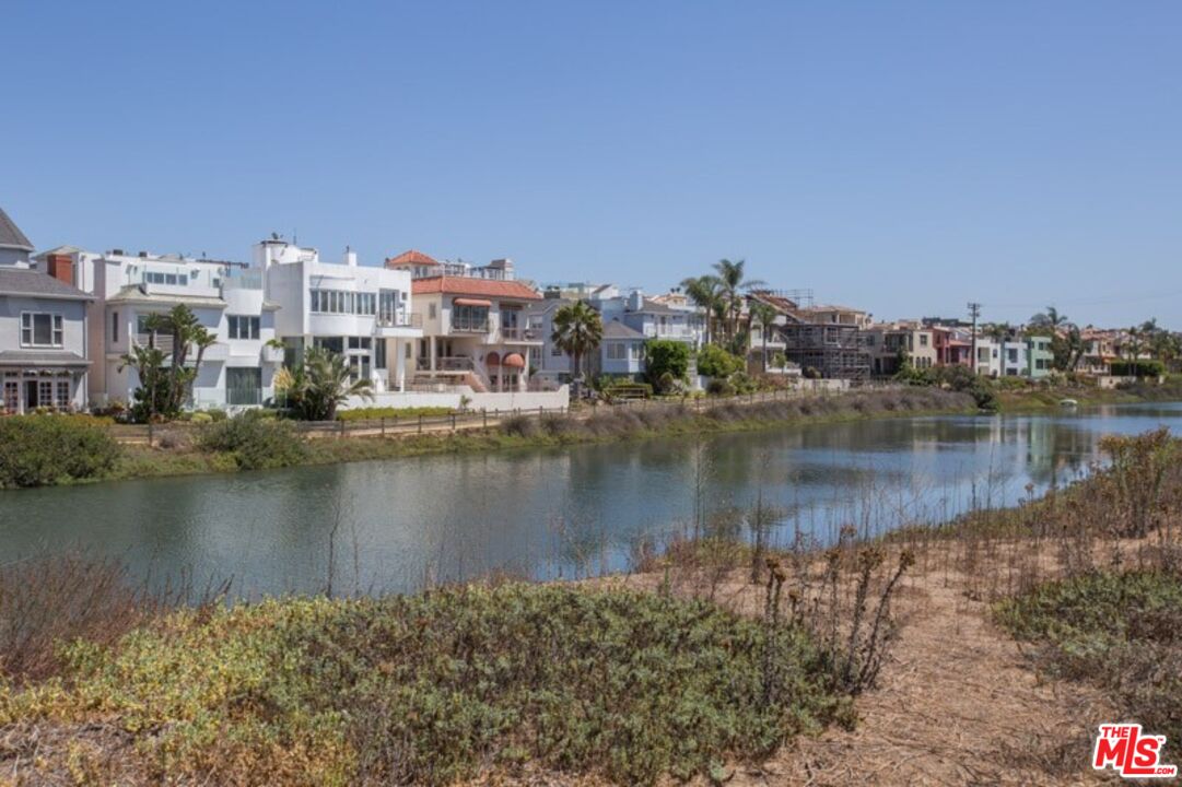 25 Spinnaker Street, Unit 12 Marina del Rey, CA 90292 - Photo 28 of 29 a view of a lake with a city