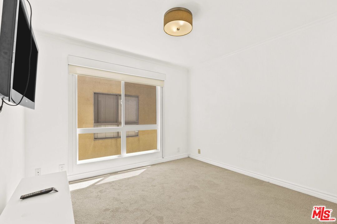 25 Spinnaker Street, Unit 12 Marina del Rey, CA 90292 - Photo 9 of 29 a view of an empty room with a window