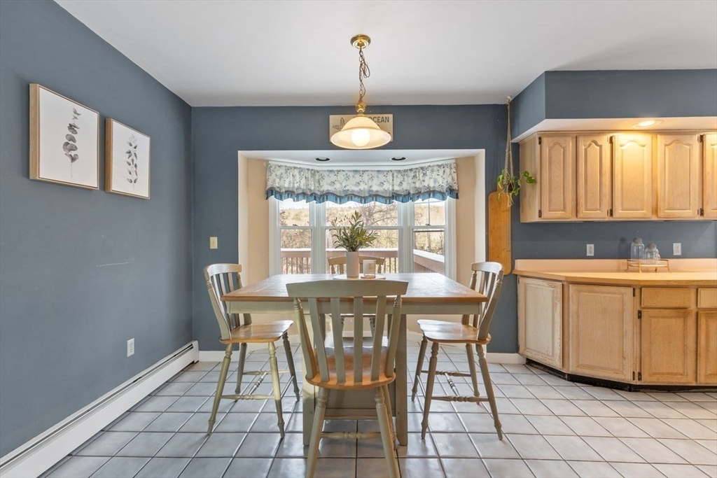 204 Old Farm Road Leominster, MA 01453 - Photo 18 of 40 a view of a dining room with furniture window and outside view