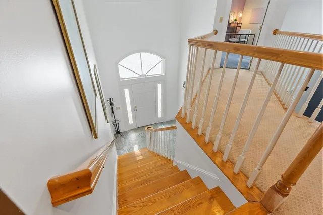 a view of an empty room and a window