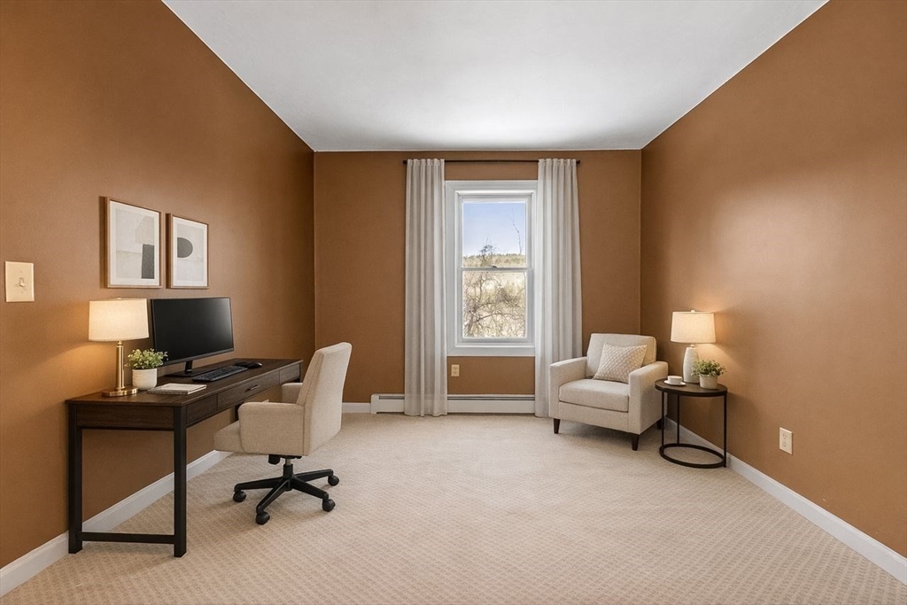 204 Old Farm Road Leominster, MA 01453 - Photo 26 of 40 a view of a workspace with a window and lounge chair