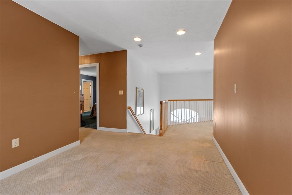 204 Old Farm Road Leominster, MA 01453 - Photo 27 of 40 a view of an empty room and a window