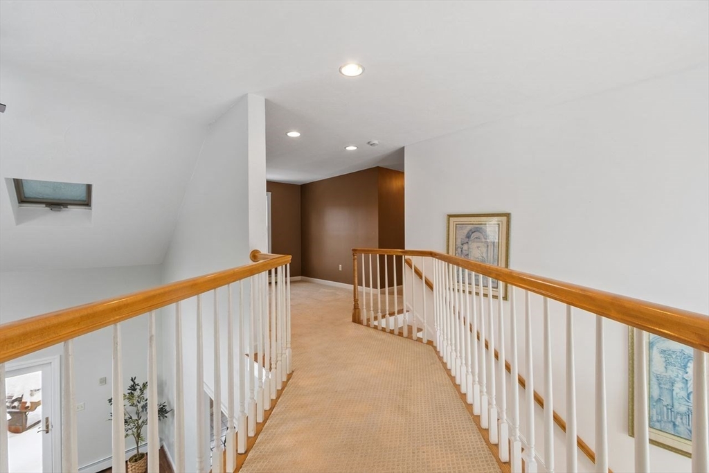 204 Old Farm Road Leominster, MA 01453 - Photo 28 of 40 a view of a hallway with wooden floor