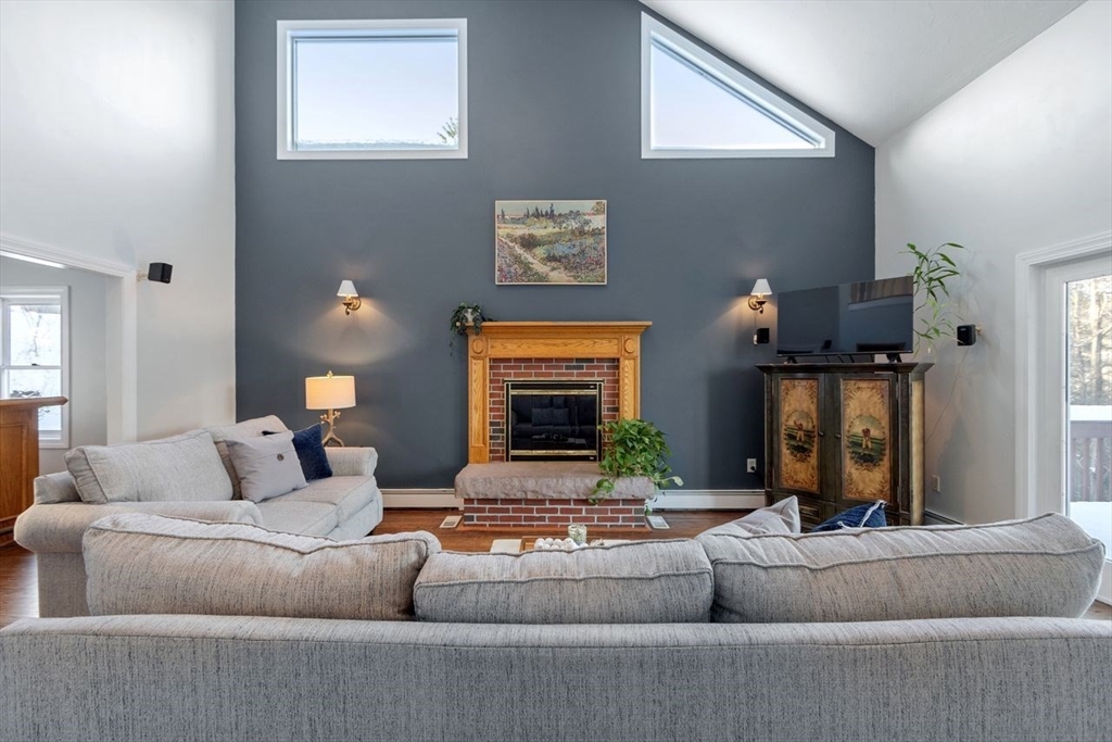 204 Old Farm Road Leominster, MA 01453 - Photo 6 of 40 a living room with furniture and a fireplace