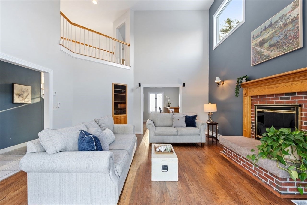 204 Old Farm Road Leominster, MA 01453 - Photo 8 of 40 a living room with furniture and a fireplace