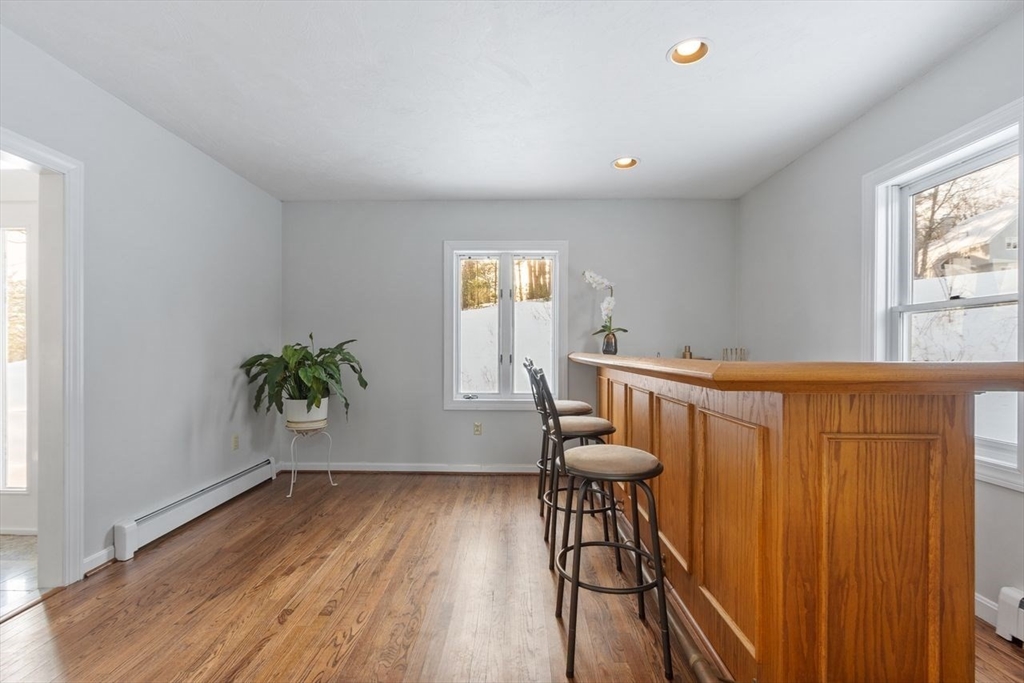204 Old Farm Road Leominster, MA 01453 - Photo 9 of 40 a workspace room with furniture and wooden floor
