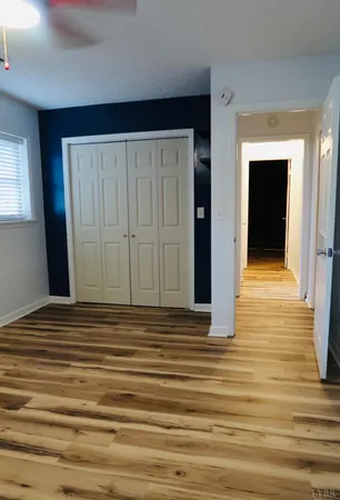 a stone house with wooden floor