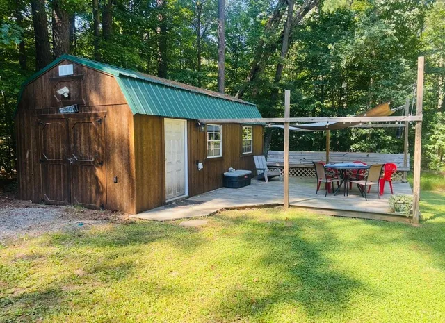 a view of swimming pool with a backyard
