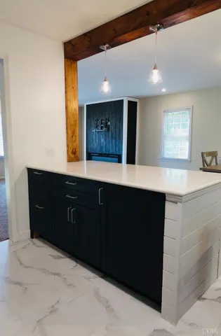 a bathroom with a sink vanity and a mirror