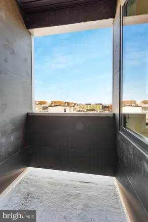 a view of a balcony with an ocean view