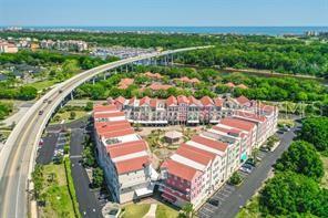 101 Palm Harbor Parkway, Unit A403 Palm Coast, FL 32137 - Photo 5 of 5 a view of a city from a balcony