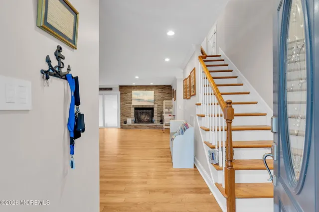 a view of entryway with wooden floor