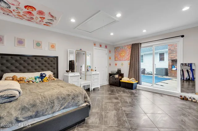 a roof deck with table and chairs barbeque with wooden floor and fence