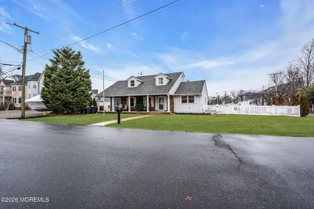 a view of a house with a big yard