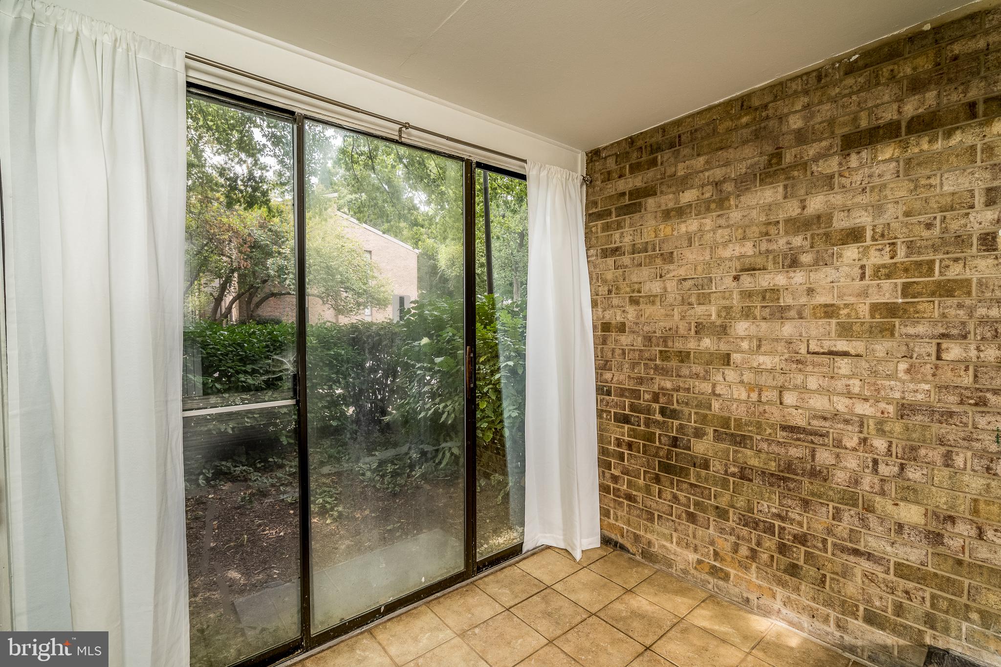 10564 Twin Rivers Road, Unit B2 Columbia, MD 21044 - Photo 8 of 28 Sunroom