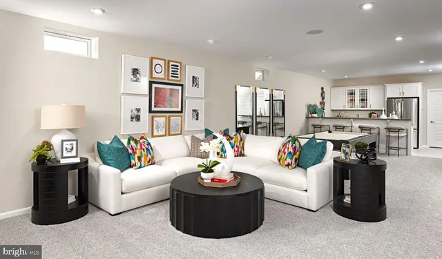 a living room with furniture and a couch