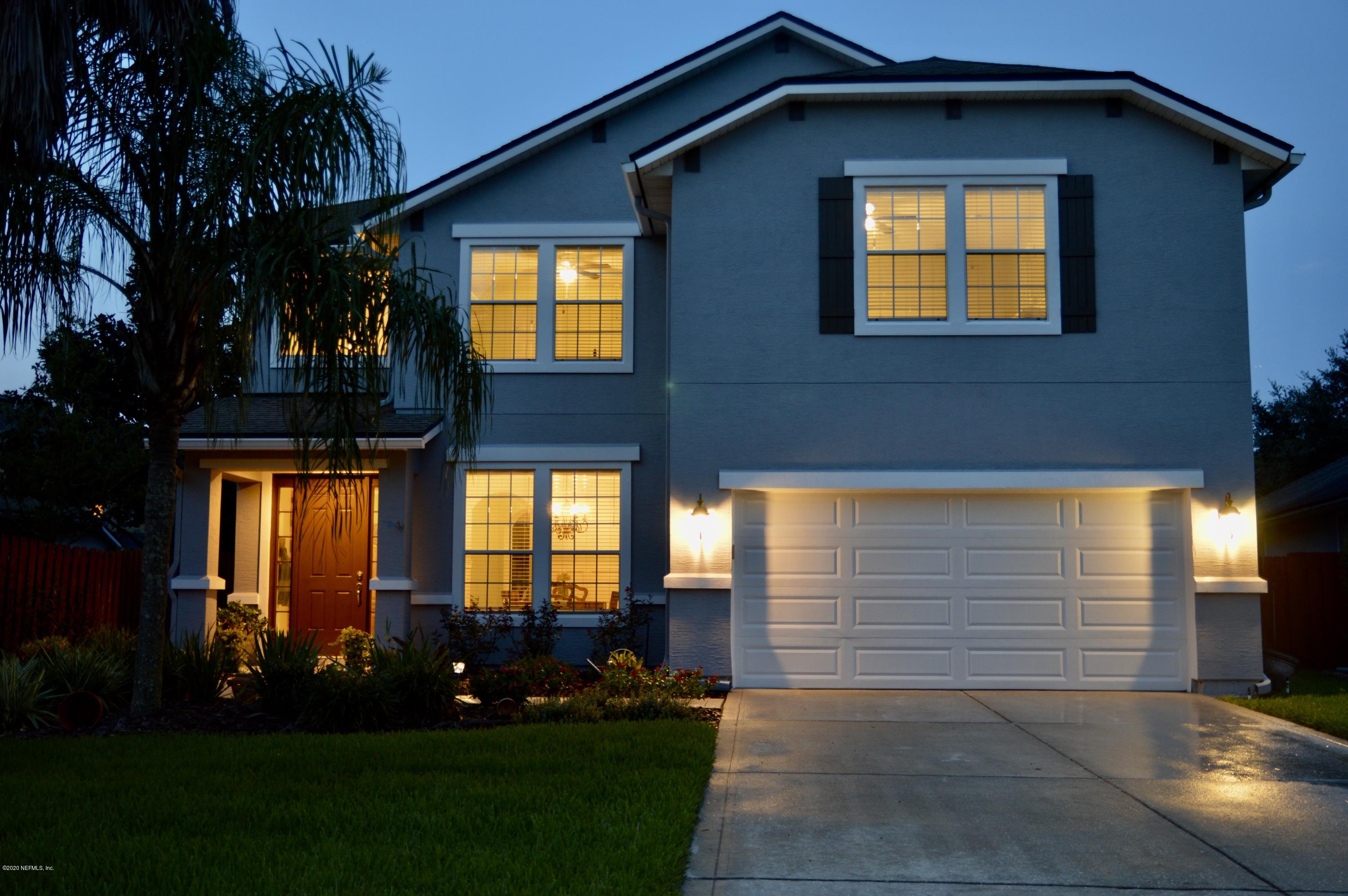 3412 South Saxxon Road St. Augustine, FL 32092 - Photo 1 of 23 a view of a house with a yard