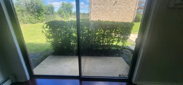 a view of a glass door and porch