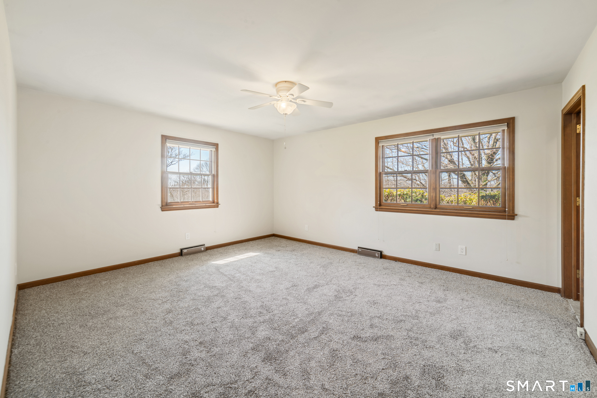 131 Sentinel Hill Road Derby, CT 06418 - Photo 22 of 40 an empty room with windows and fan