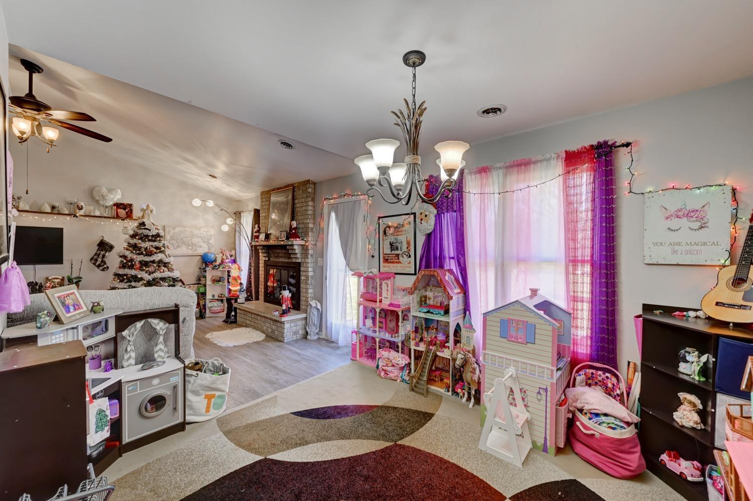 12134 North 332E Thayer, IN 46381 - Photo 5 of 16 a view of a room with workspace and toys
