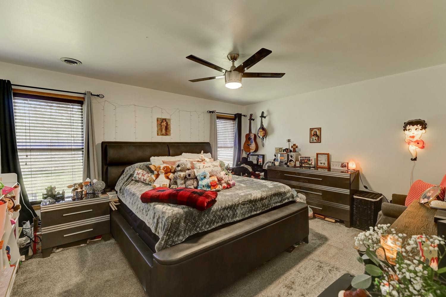 12134 North 332E Thayer, IN 46381 - Photo 6 of 16 a bedroom with bed and a window