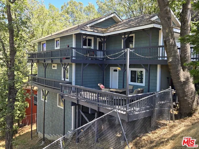a front view of a house with balcony