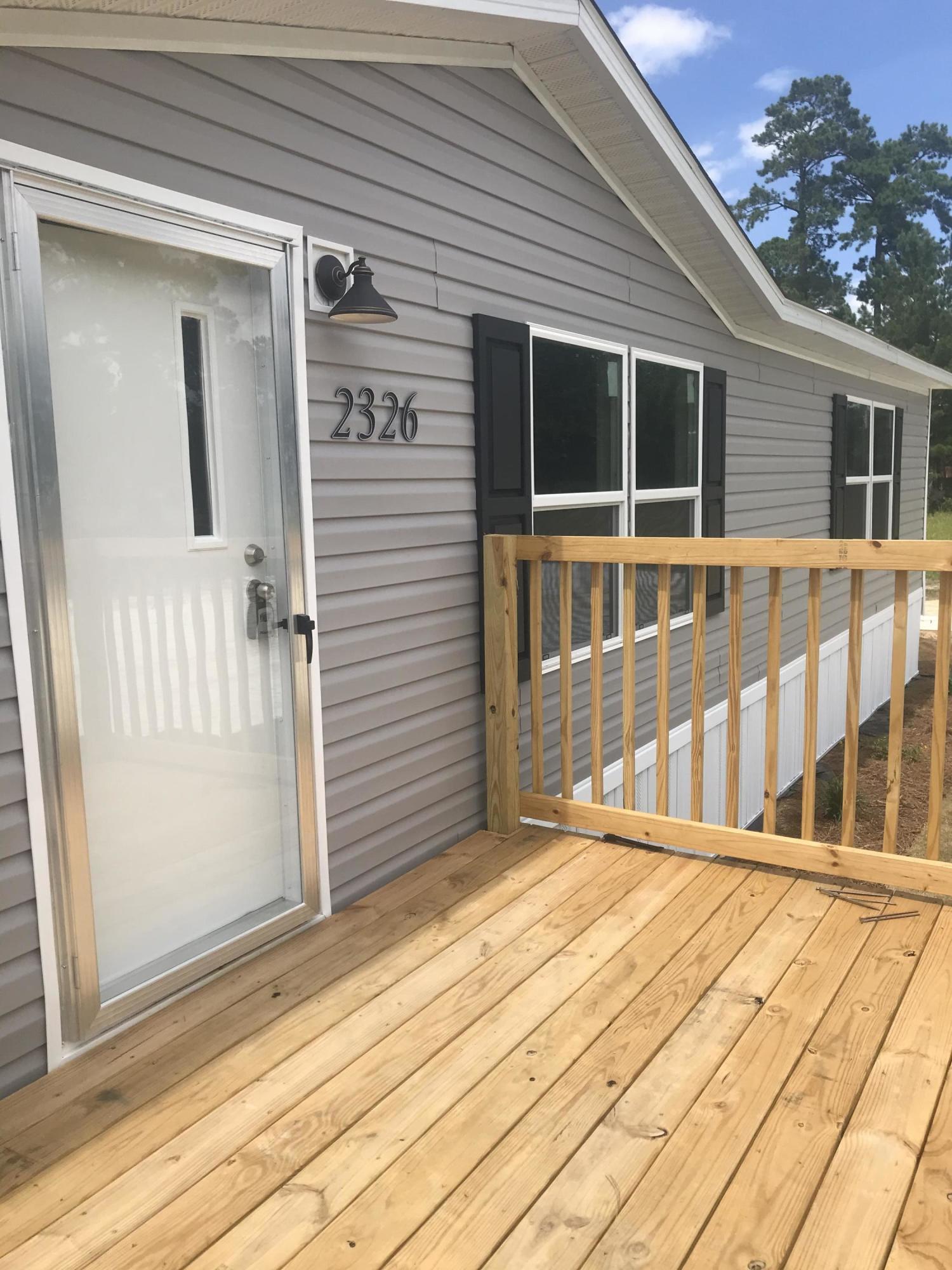 2326 Cooper Store Road Moncks Corner, SC 29461 - Photo 1 of 8 58E33DB6-9C82-445C-8682-FF099CC1CC25