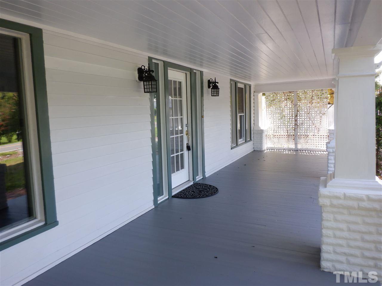 1516 Bahama Road Bahama, NC 27503 - Photo 2 of 25 This porch was made for sweet tea, shelling peas, rocking chairs and swings.