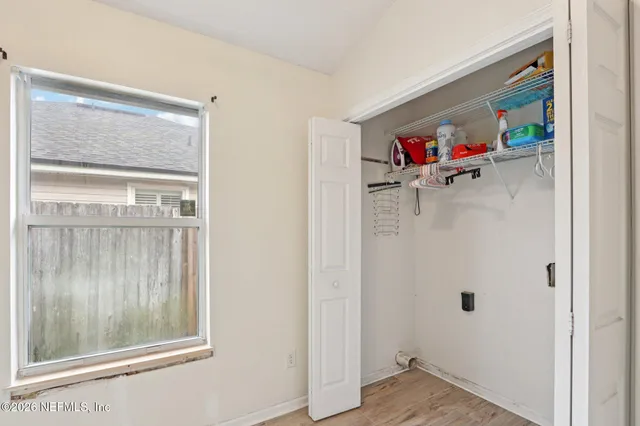 a view of storage and utility room