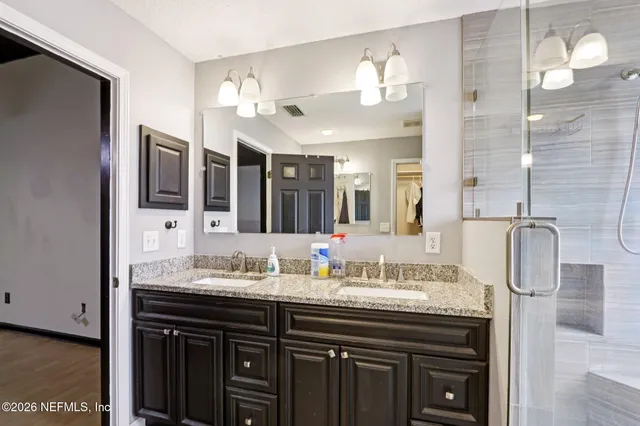 a view of a livingroom with furniture and chandelier