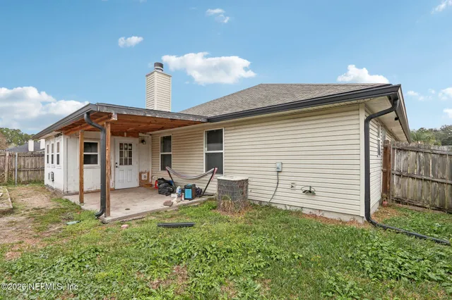 a front view of a house with a patio