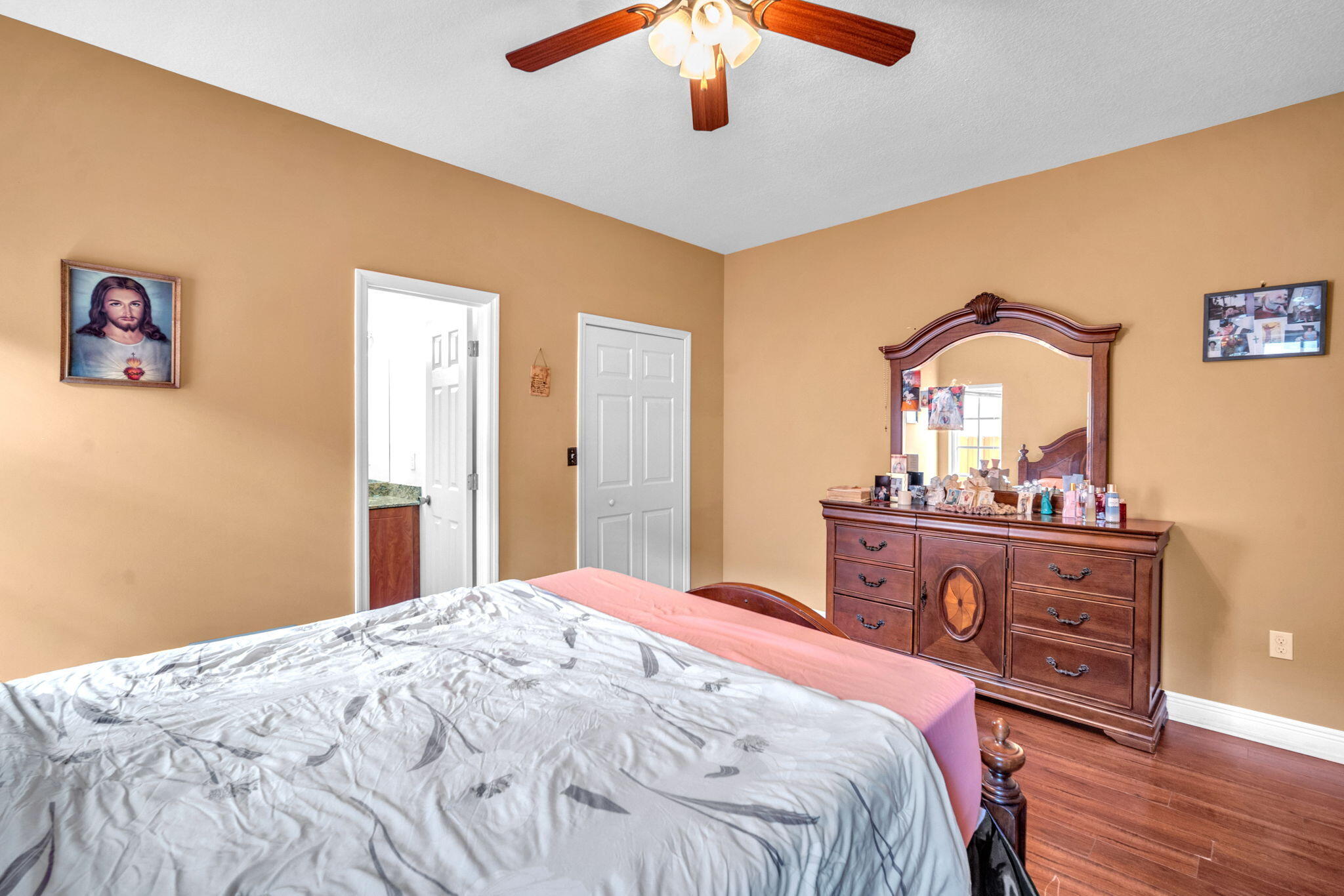 1395 West 30th Street Hialeah, FL 33012 - Photo 24 of 26 a bedroom with a bed and a dresser