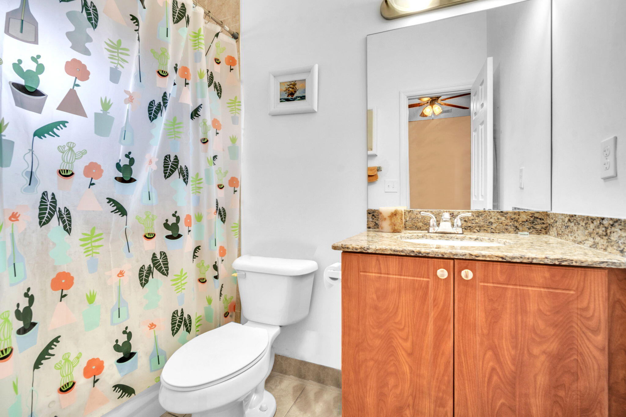 1395 West 30th Street Hialeah, FL 33012 - Photo 26 of 26 a white toilet sitting next to a bathroom sink
