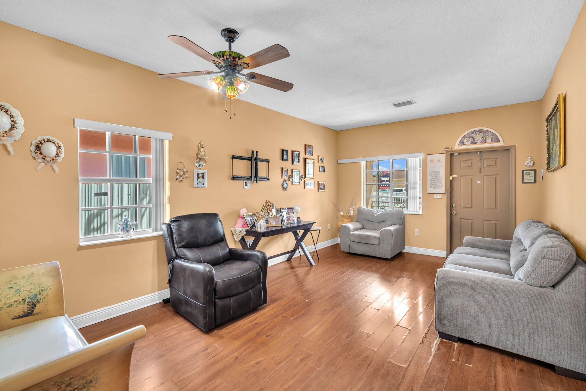 1395 West 30th Street Hialeah, FL 33012 - Photo 3 of 26 a living room with furniture and a large window