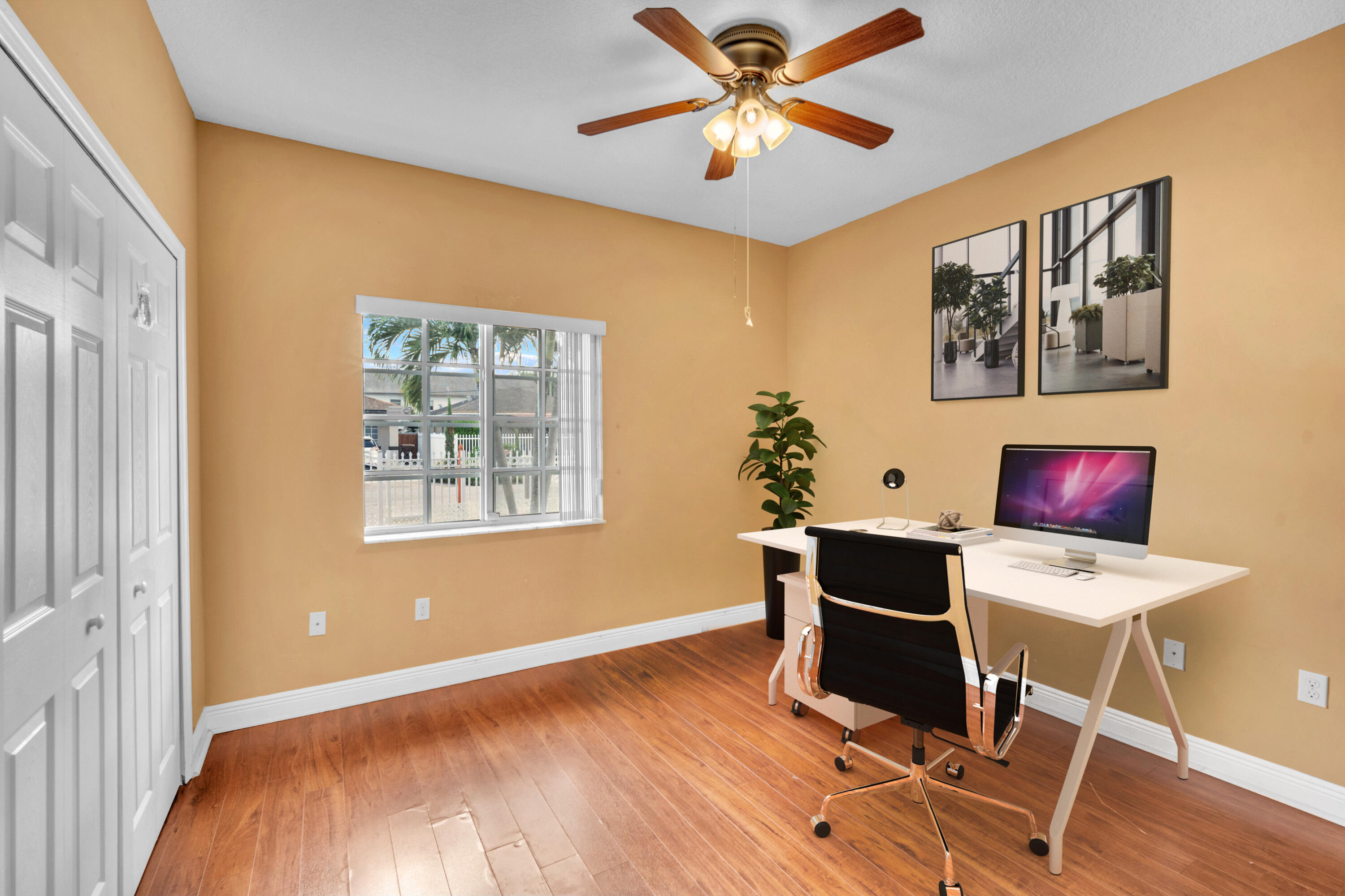 1395 West 30th Street Hialeah, FL 33012 - Photo 5 of 26 a workspace with furniture window and wooden floor