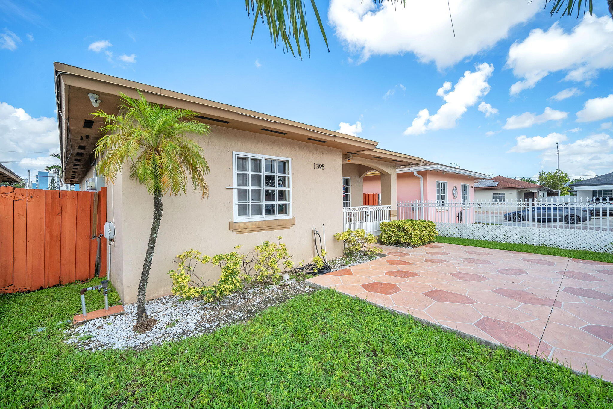 1395 West 30th Street Hialeah, FL 33012 - Photo 8 of 26 a view of a house with a yard