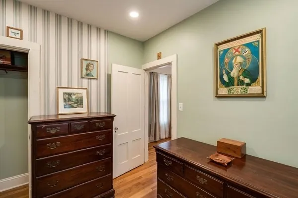 a view of room with window and cabinet