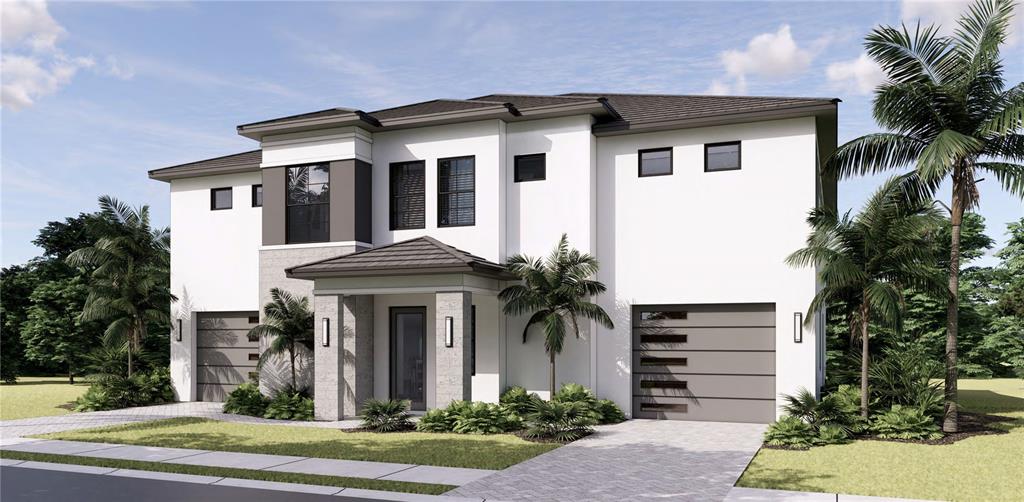 7401 Midnight Pass Road Sarasota, FL 34242 - Photo 10 of 20 a front view of a house with a yard and garage
