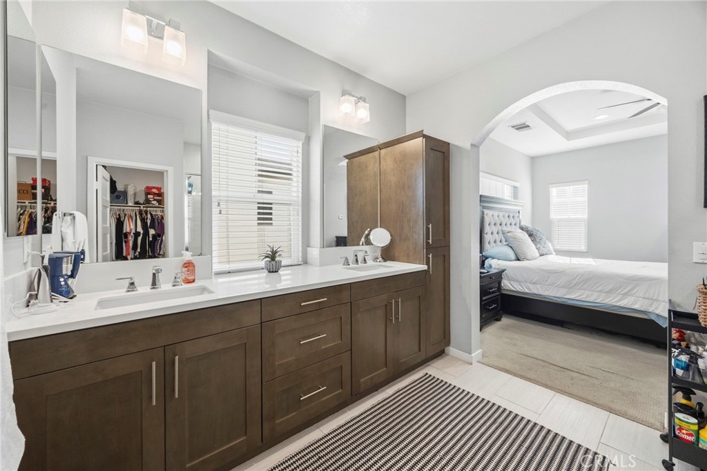 2049 North Orange Olive Road Orange, CA 92865 - Photo 24 of 36 a en suite bathroom with a double vanity sink a mirror and a shower