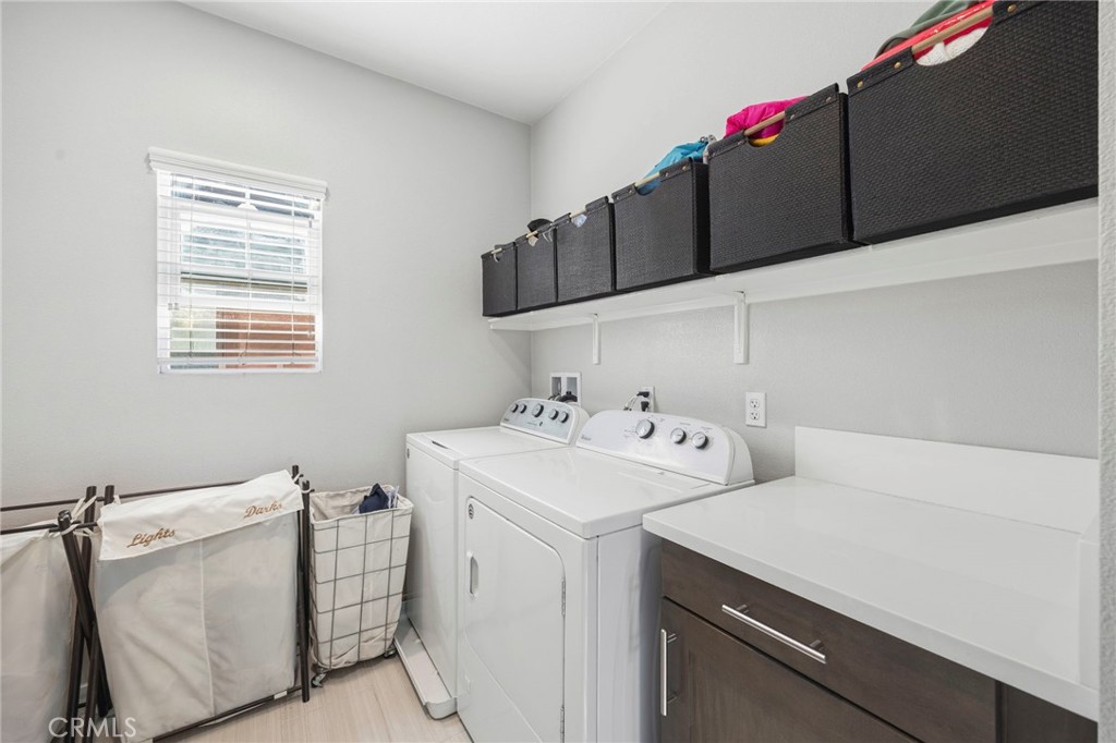 2049 North Orange Olive Road Orange, CA 92865 - Photo 29 of 36 a utility room with dryer and washer
