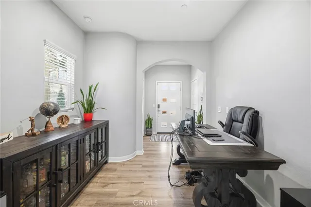 a view of a workspace with furniture