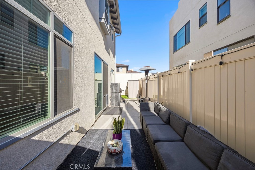 2049 North Orange Olive Road Orange, CA 92865 - Photo 32 of 36 a building outdoor space with patio furniture