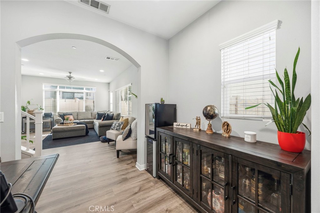 2049 North Orange Olive Road Orange, CA 92865 - Photo 5 of 36 a living room with furniture and a potted plant