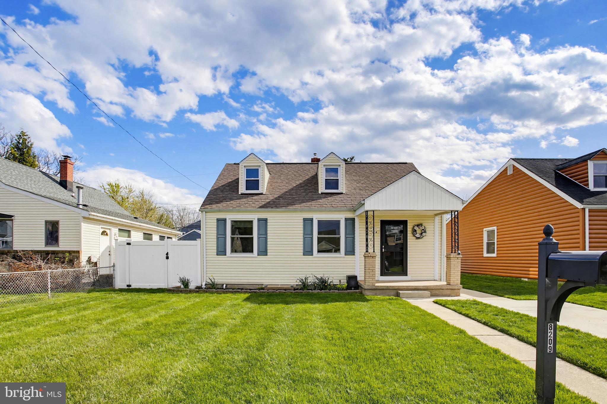 8209 Longpoint Road Baltimore, MD 21222 - Photo 1 of 37 a view of a house with backyard