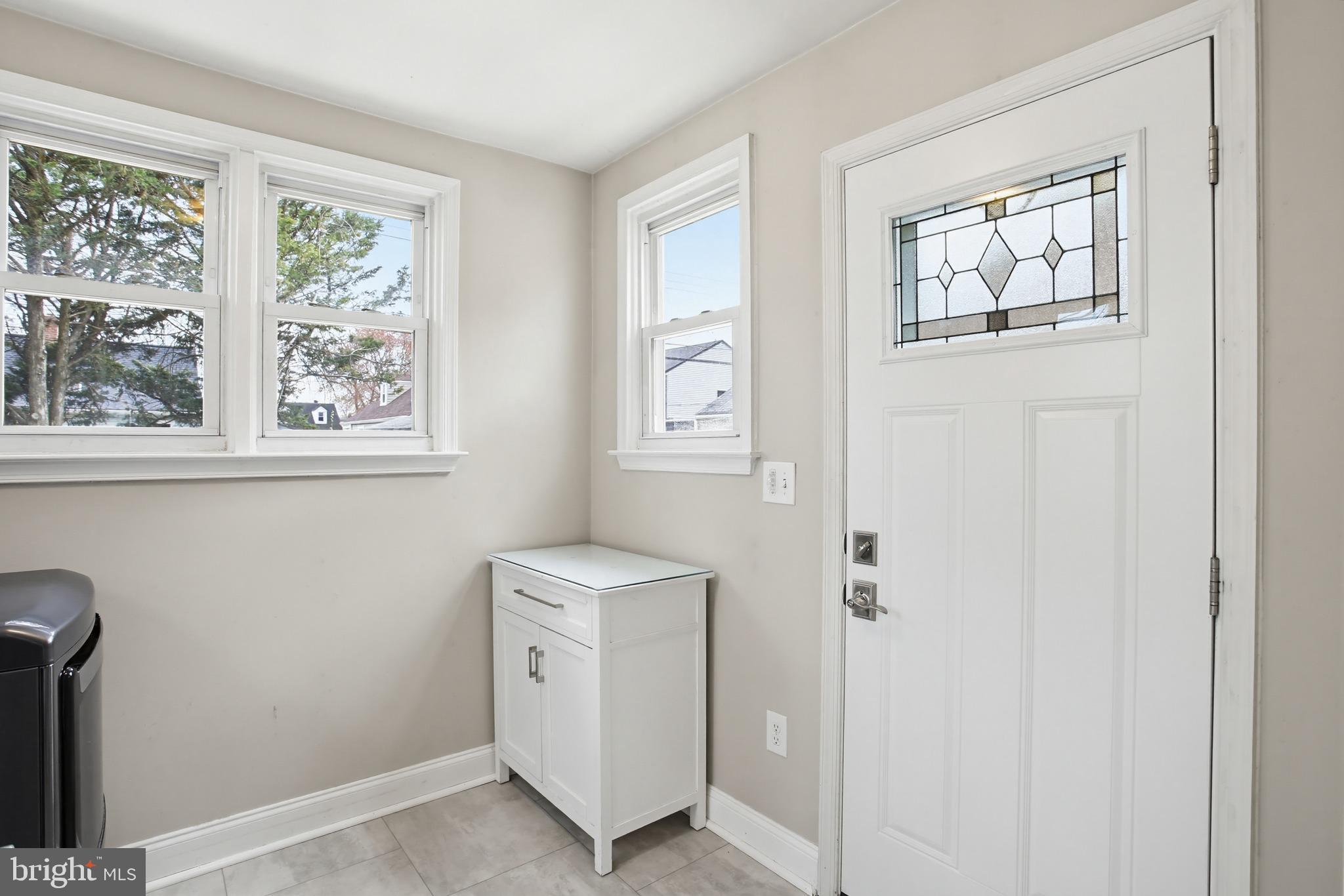 8209 Longpoint Road Baltimore, MD 21222 - Photo 13 of 37 a view of an empty room with a window