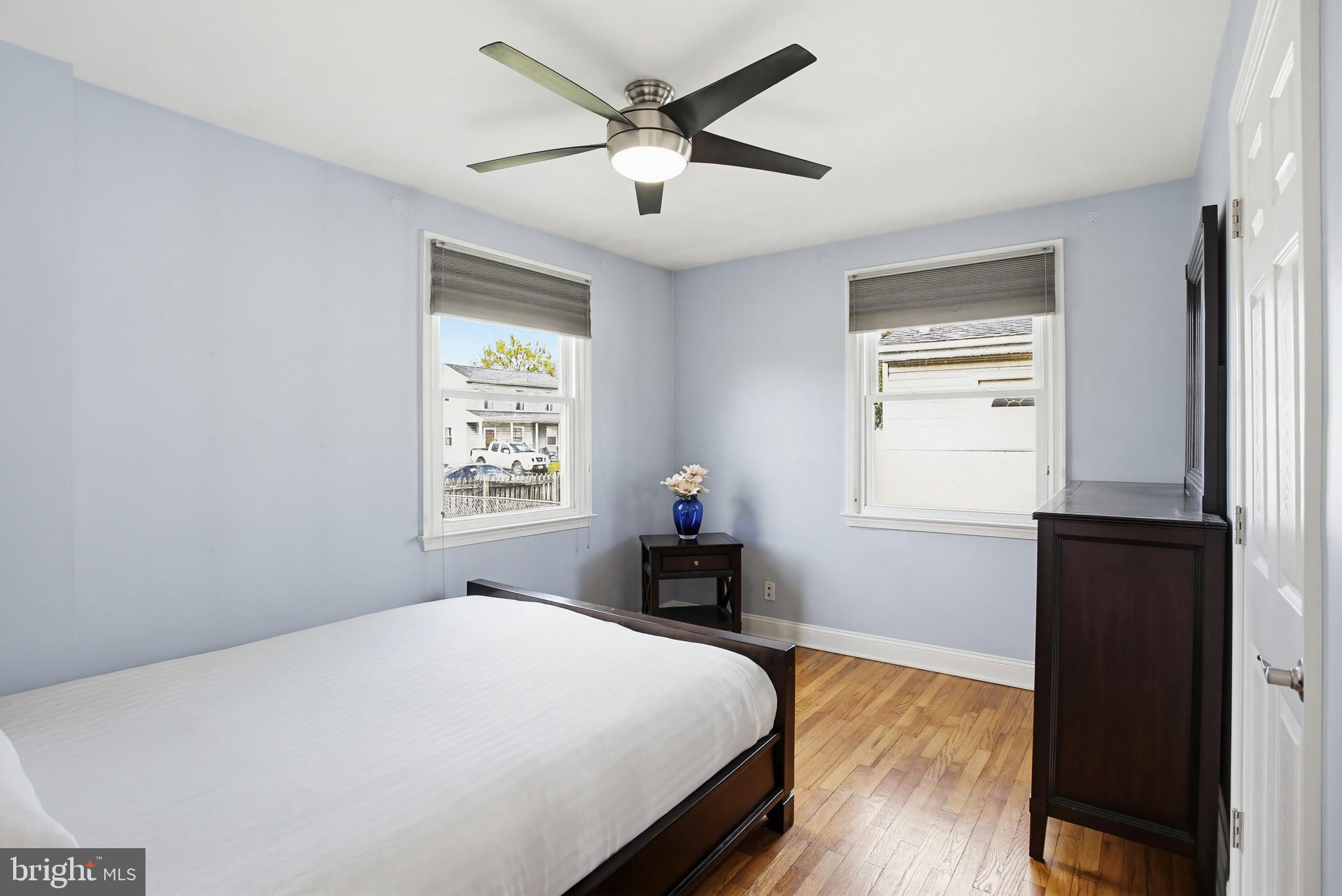 8209 Longpoint Road Baltimore, MD 21222 - Photo 16 of 37 a bedroom with a bed and a window