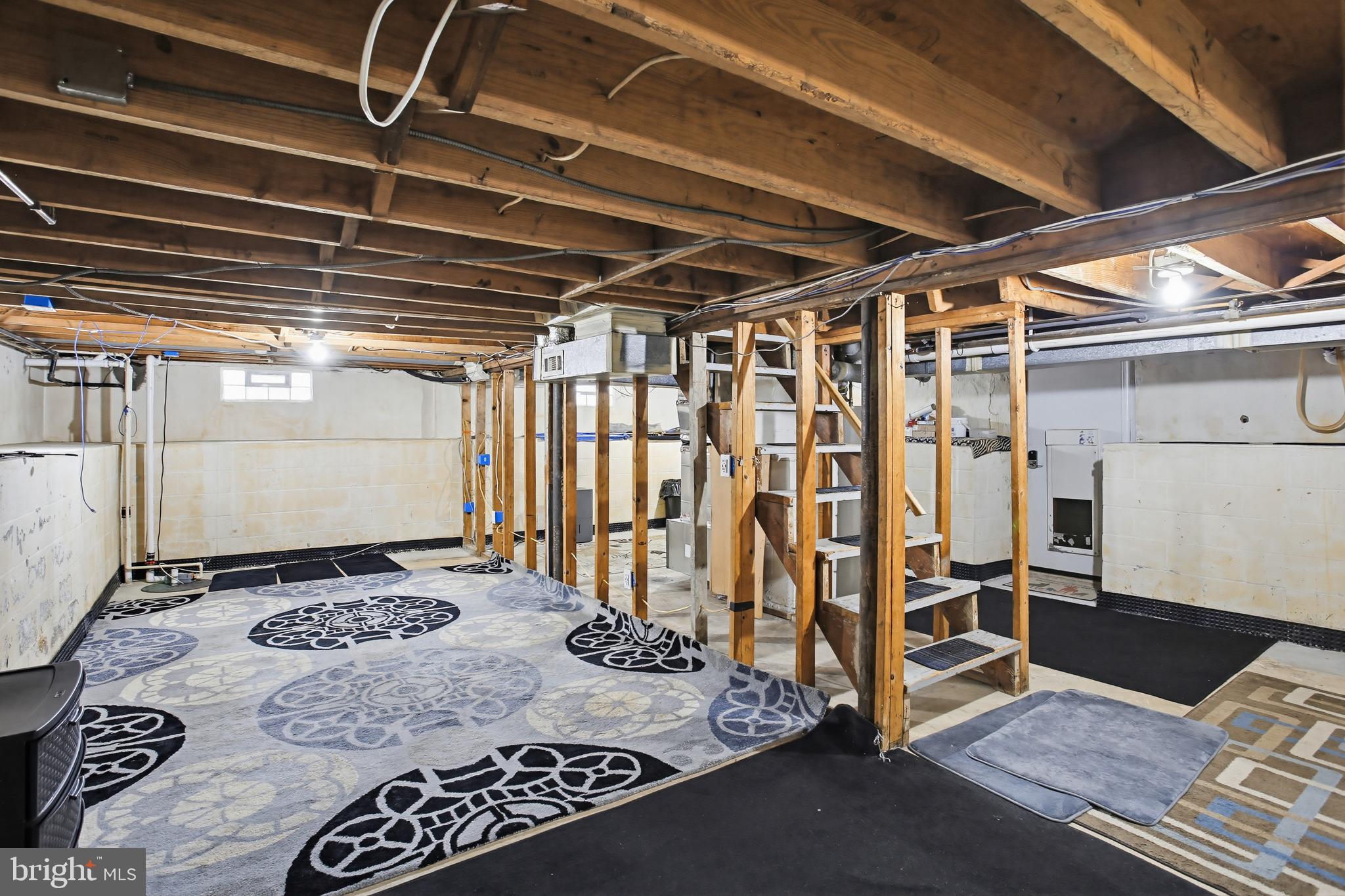 8209 Longpoint Road Baltimore, MD 21222 - Photo 27 of 37 a view of an empty room with wooden floor