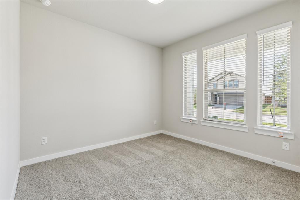 1464 Ranchero Rodeo Road Haslet, TX 76052 - Photo 25 of 33 Bedroom in the Stanley II home plan by Trophy Signature Homes – REPRESENTATIVE PHOTO